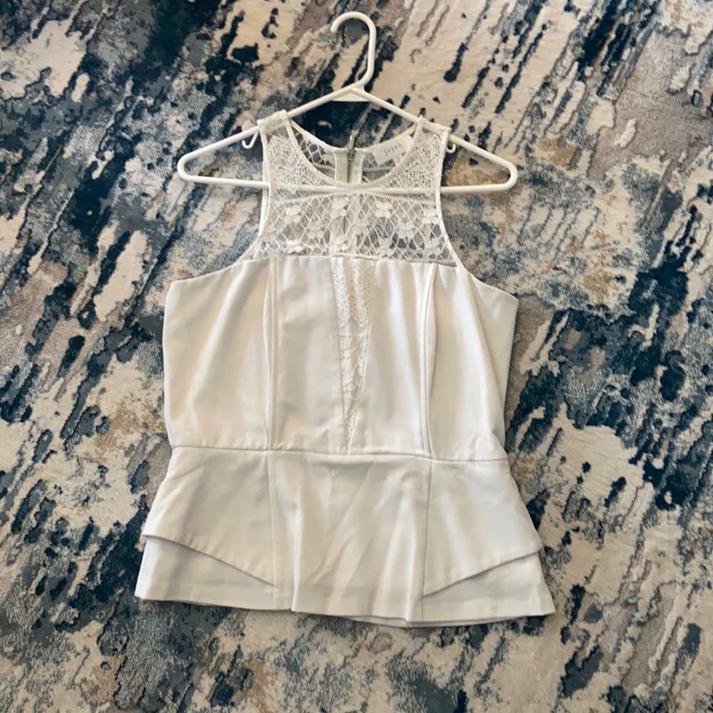 White sleeveless top